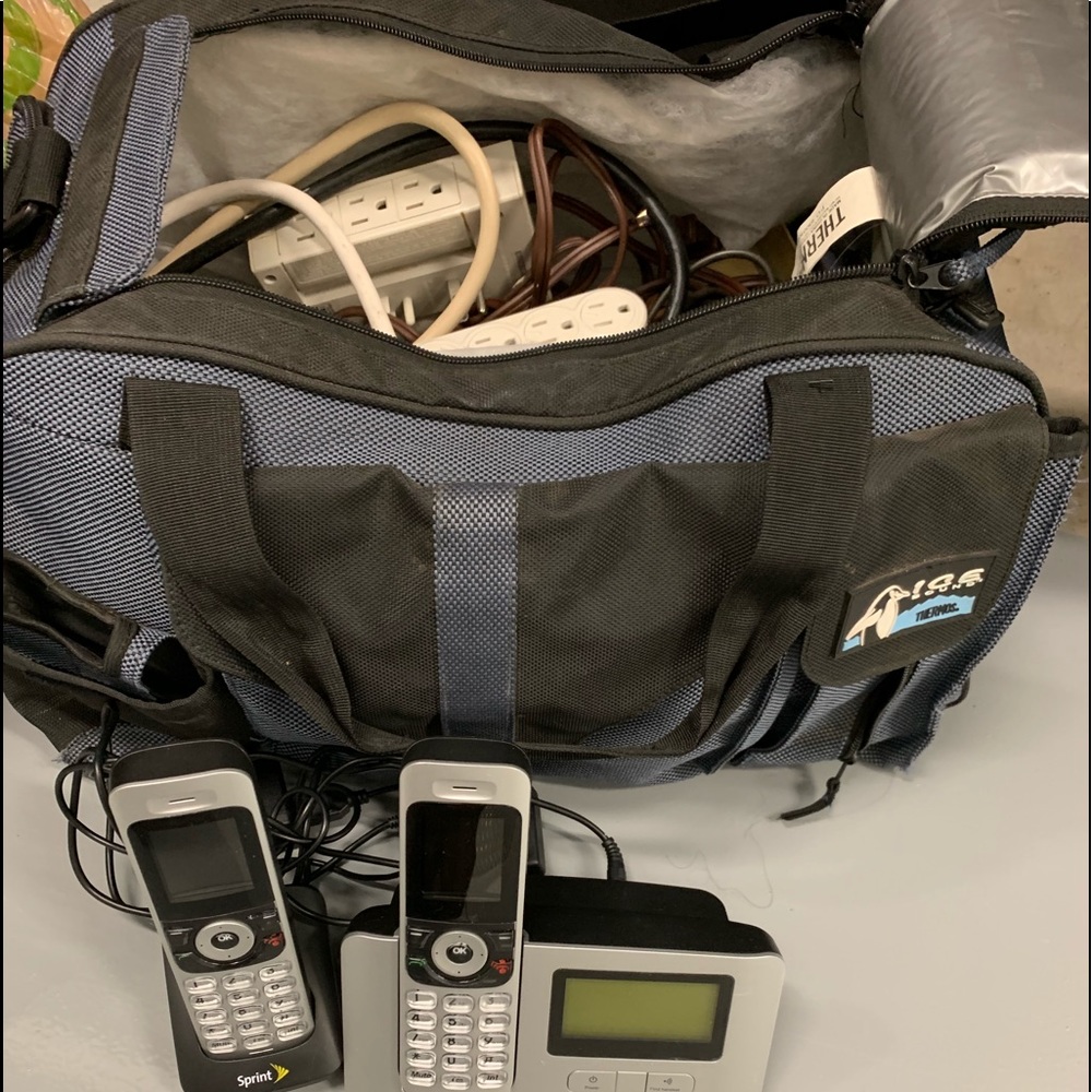 Bag with misc electrical cords, Sprint home phone.